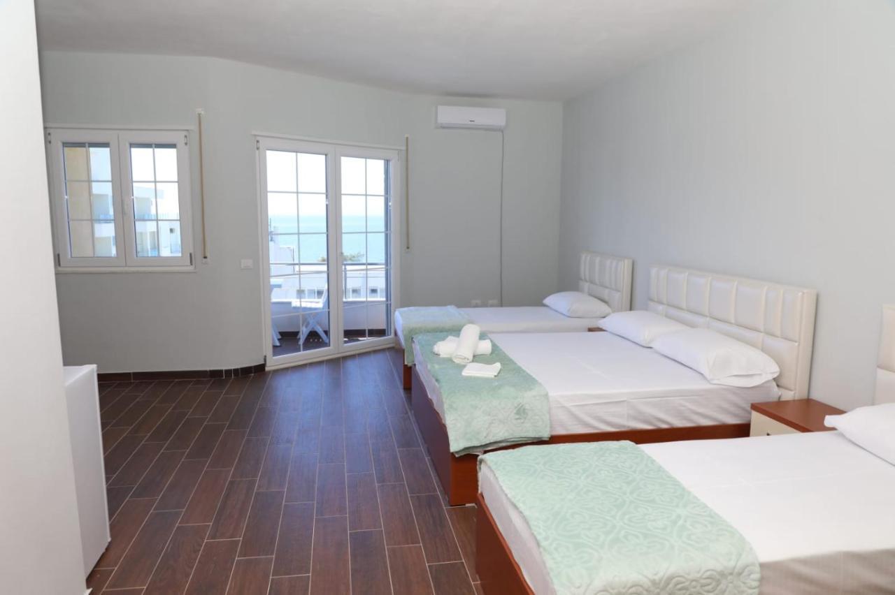 Ryan'S Hotel Shengjin Bagian luar foto