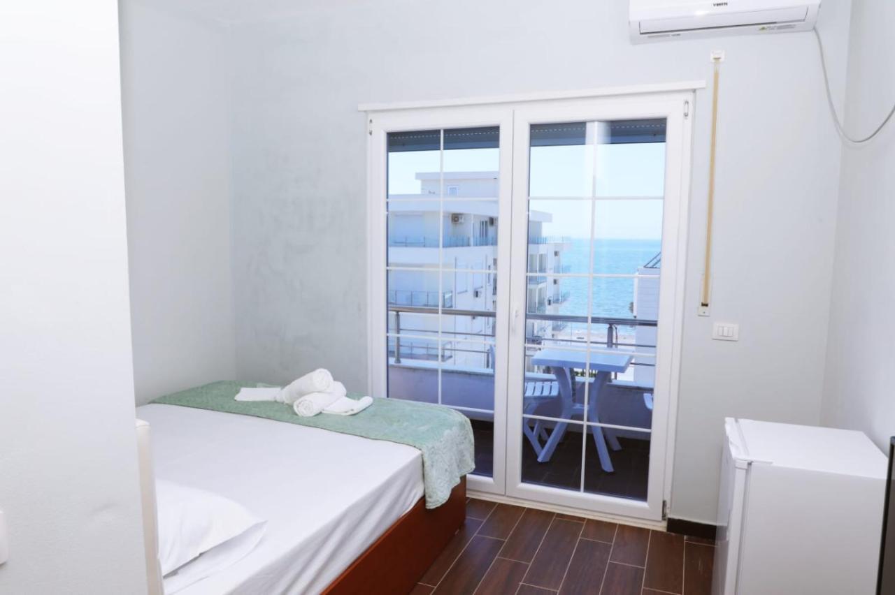 Ryan'S Hotel Shengjin Bagian luar foto